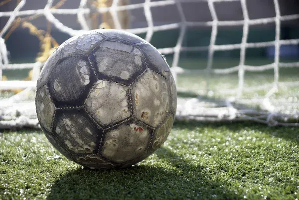 depositphotos_7226007-stock-photo-soccer-ball-on-the-field